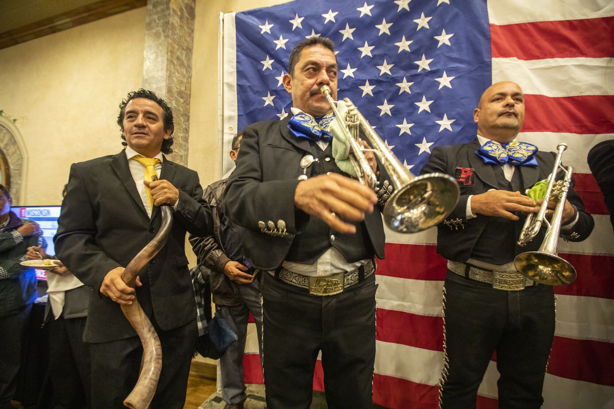 A mariachi band performs during Robert Luna's election night party in Long Beach.