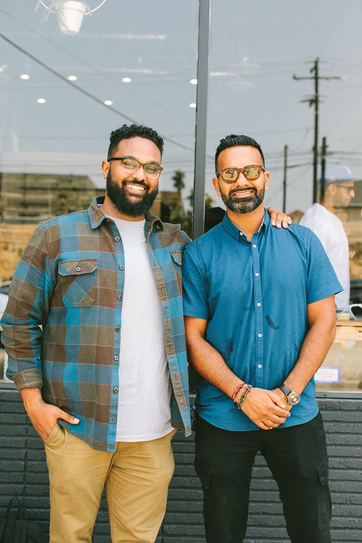 Yonnie Hagos, left and Ajay Relan, right, founders of Hilltop Coffee & Kitchen.