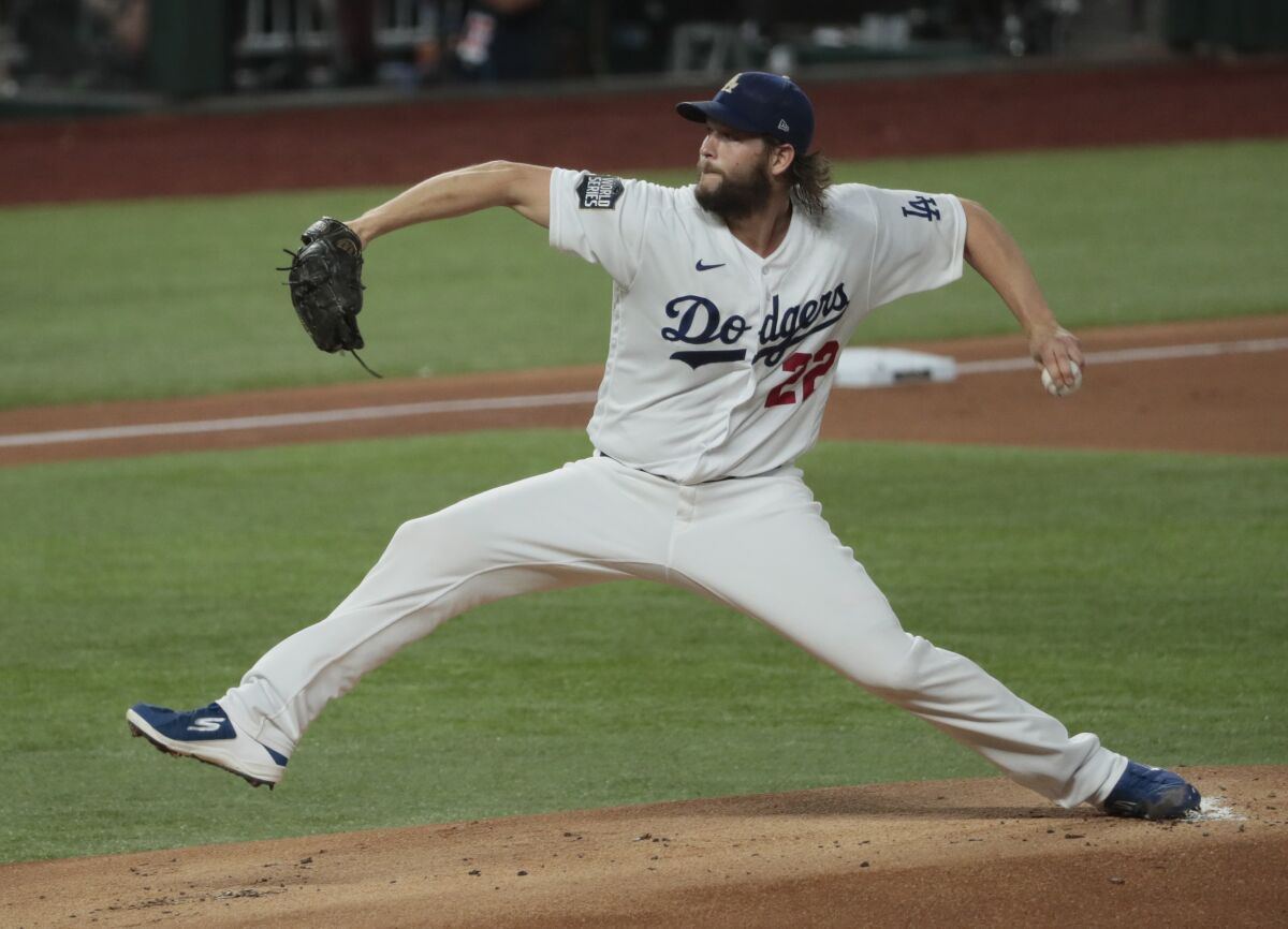 Dodgers pitcher Clayton Kershaw throws a pitch against the Tampa Bay Rays.