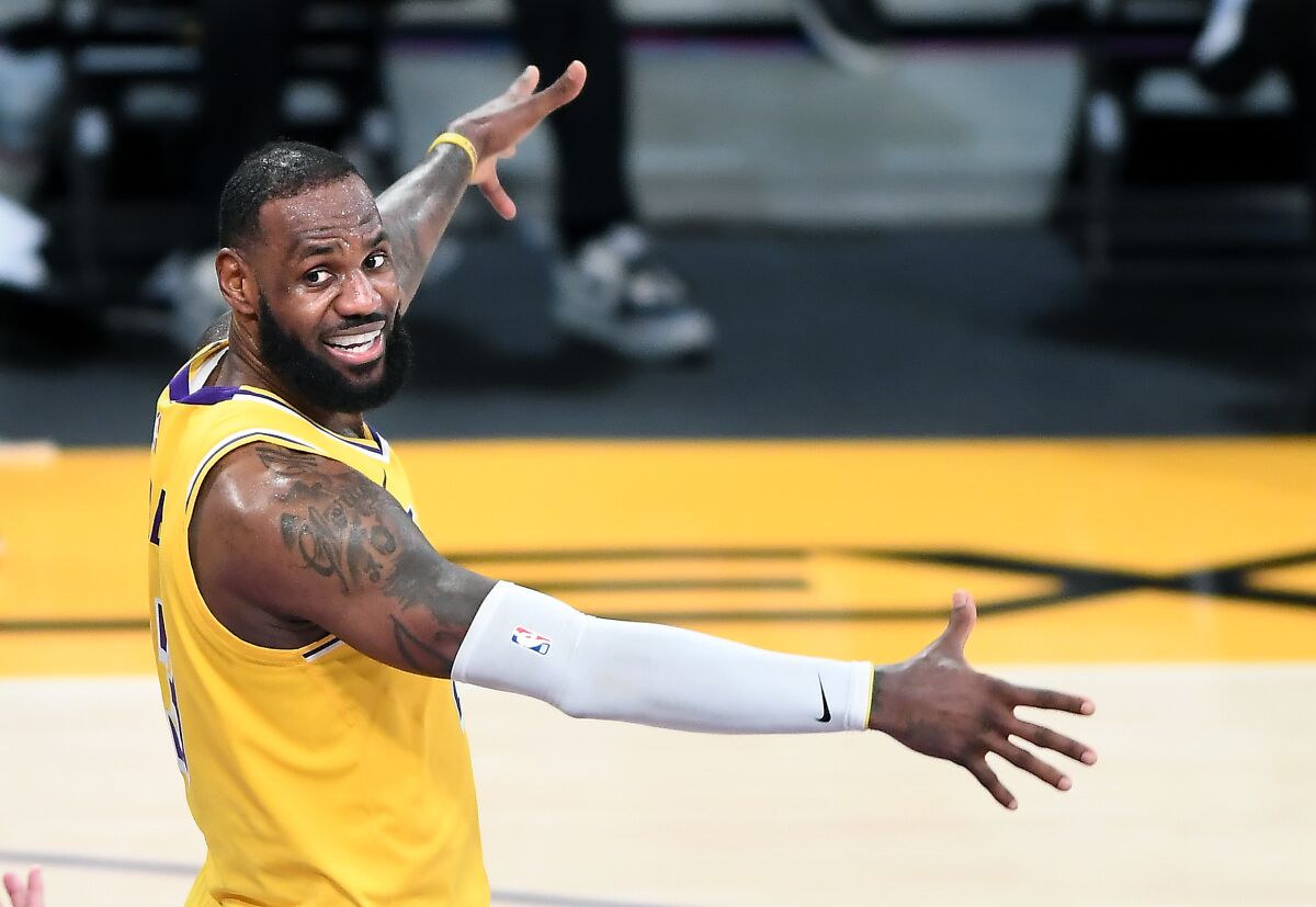 Lakers star LeBron James is all smiles during a victory over the Oklahoma City Thunder in February.