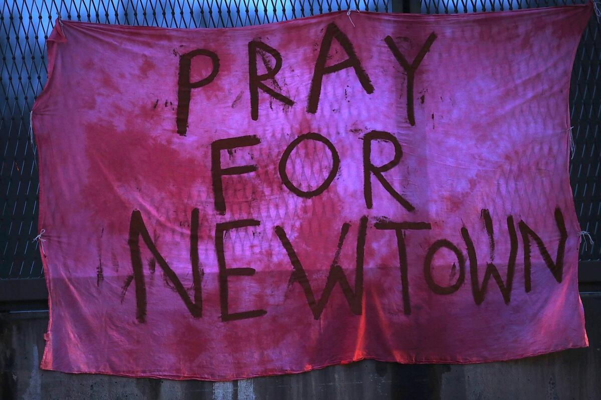 Connecticut state police have released a report concluding their investigation of the Dec. 14, 2012, Newtown school shooting that left 20 children and six women dead inside Sandy Hook Elementary School. After the shooting the town saw numerous flags and signs go up memorializing the tragedy.