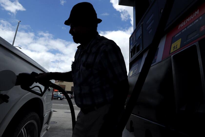 VAN NUYS, CA-MAY 25, 2018: David Micciche of Van Nuys fills up the tank on his Ford Lobo Extra Cab truck at United Oil gas station in Van Nuys on May 25, 2018. (Mel Melcon/Los Angeles Times)
