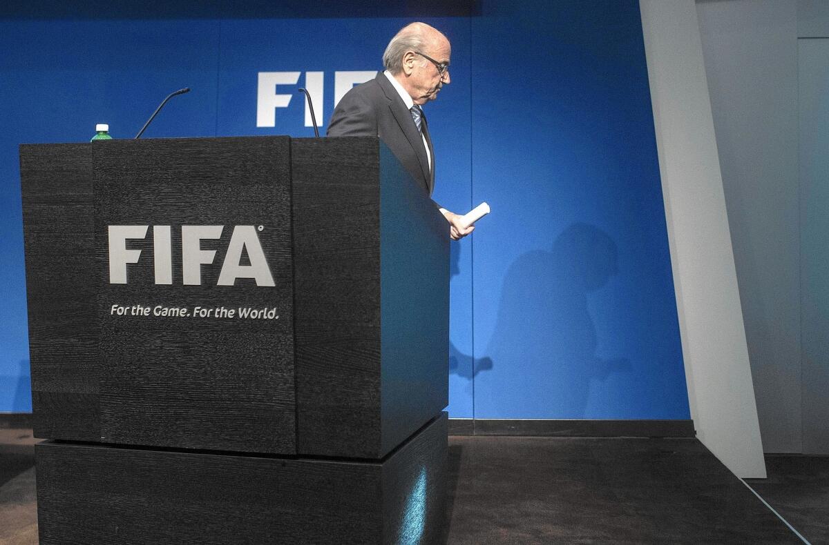 FIFA President Sepp Blatter leaves a news conference in Zurich on June 2 after announcing his resignation.