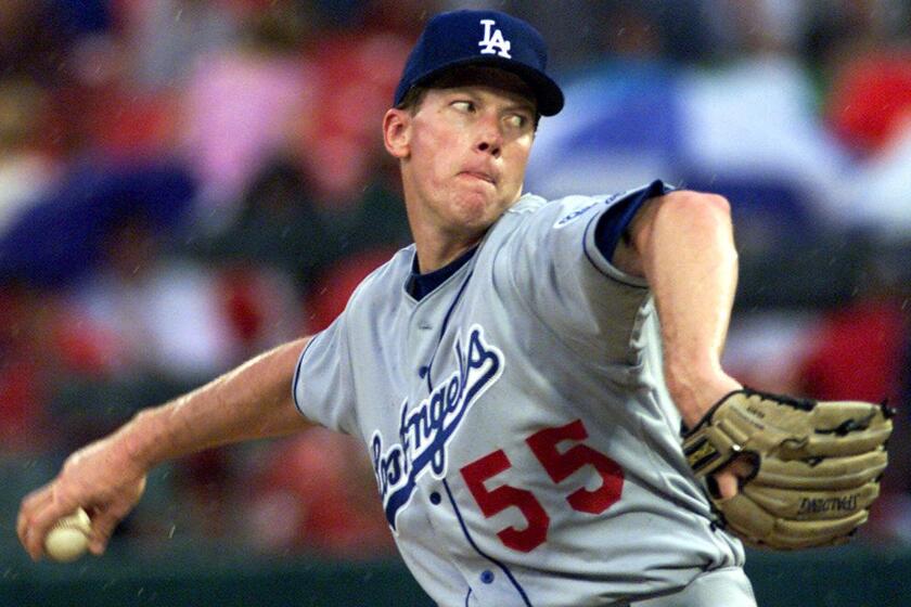 Orel Hershiser pitches for the Dodgers in 2000.