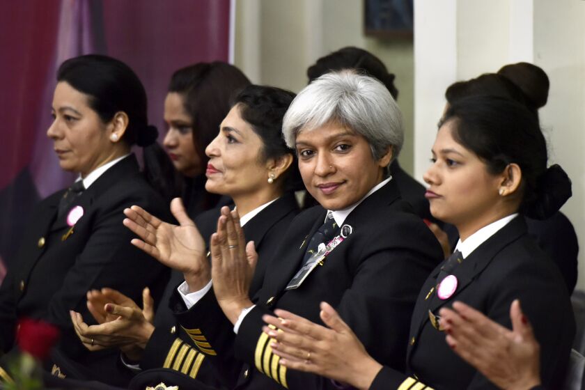 NEW DELHI, INDIA - MARCH 7: The commander of an all women Air India, the country's state owned carrier's Delhi San Francisco Delhi flight, Kshamta Bajpai, (2R), with other pilots cheers her crew during the celebration ceremony at a function on the eve of international women's day on March 7, 2017 in New Delhi, India. Air India says it has set a world record by flying around the world with an all-female crew. Press Trust of India reported that the flight flew over the Pacific Ocean from New Delhi to San Francisco on Monday, and then flew back to New Delhi over the Atlantic on Friday(Photo by Vipin Kumar/Hindustan Times via Getty Images)