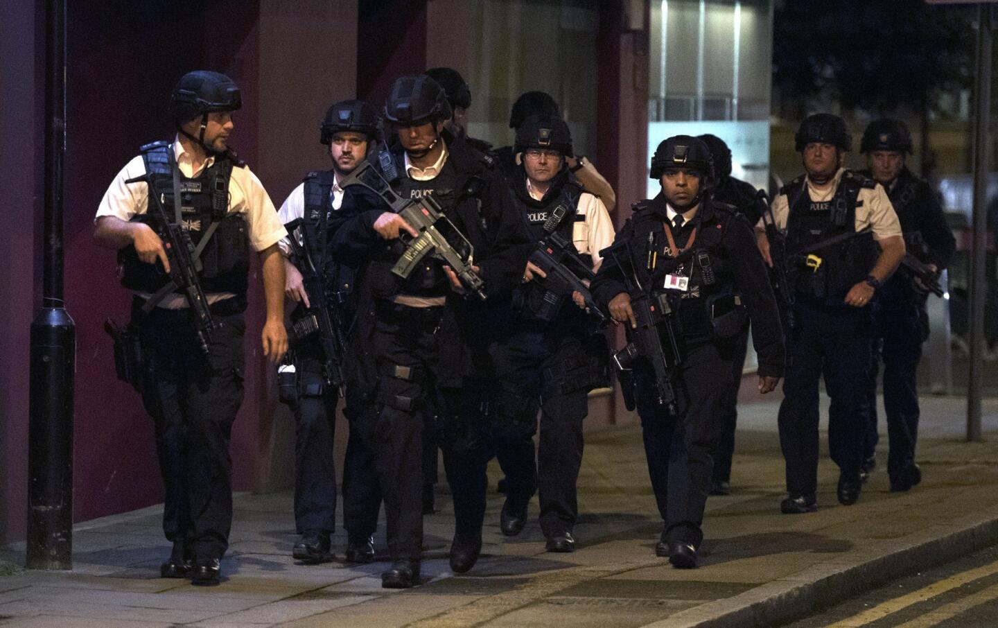 Police mobilize at London Bridge after reports of a van hitting pedestrians.