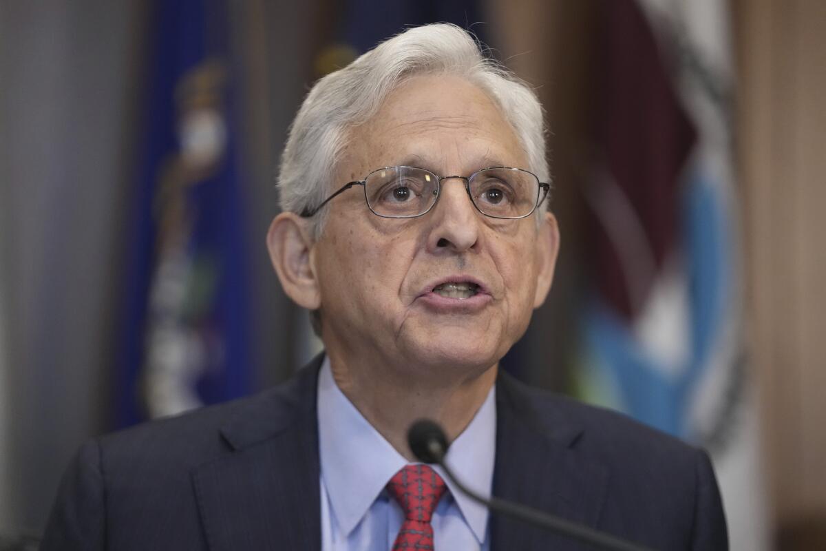 Attorney General Merrick Garland speaks during a meeting.