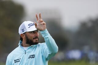 La Jolla, CA - January 28: Max Homa acknowledges the crowd after putting on the green.