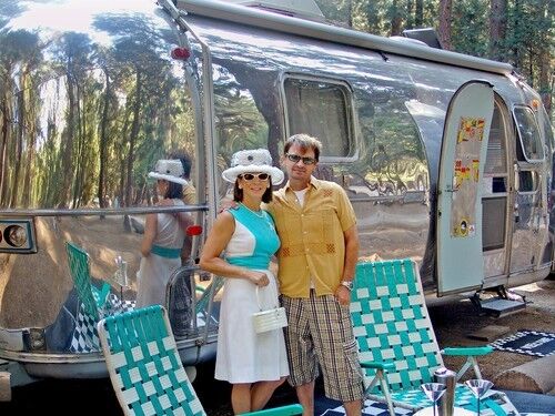There's something contagious about just looking at the simple but elegant innards of the silvery, bullet-shaped trailers -- and imagining how it would feel to take off for points unknown. In Yosemite, Tina and Michael Lambert dress the part outside their '71 International.