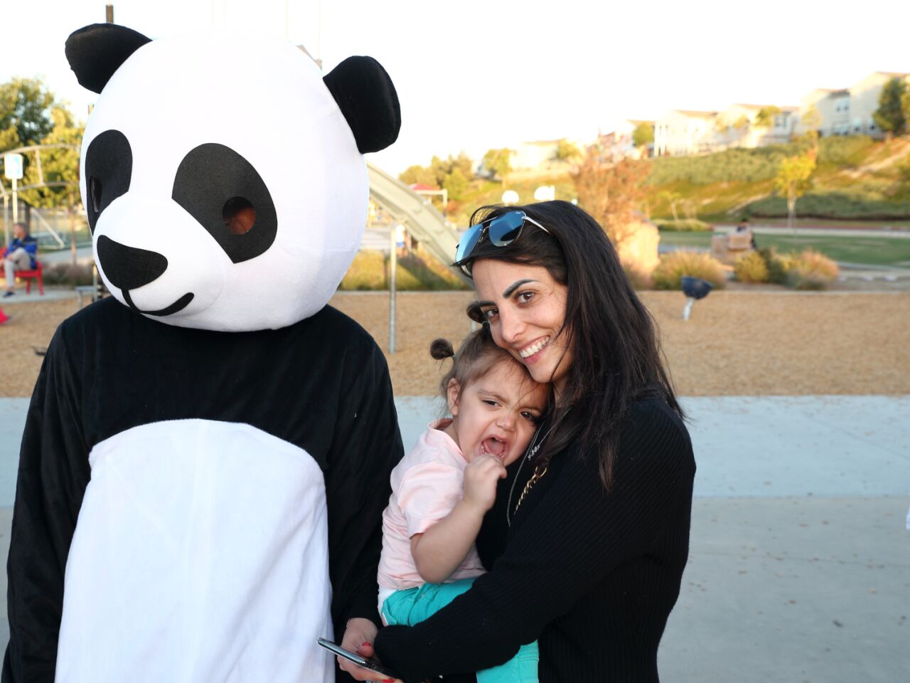 Misha and Maya Haffar with Panda mascot