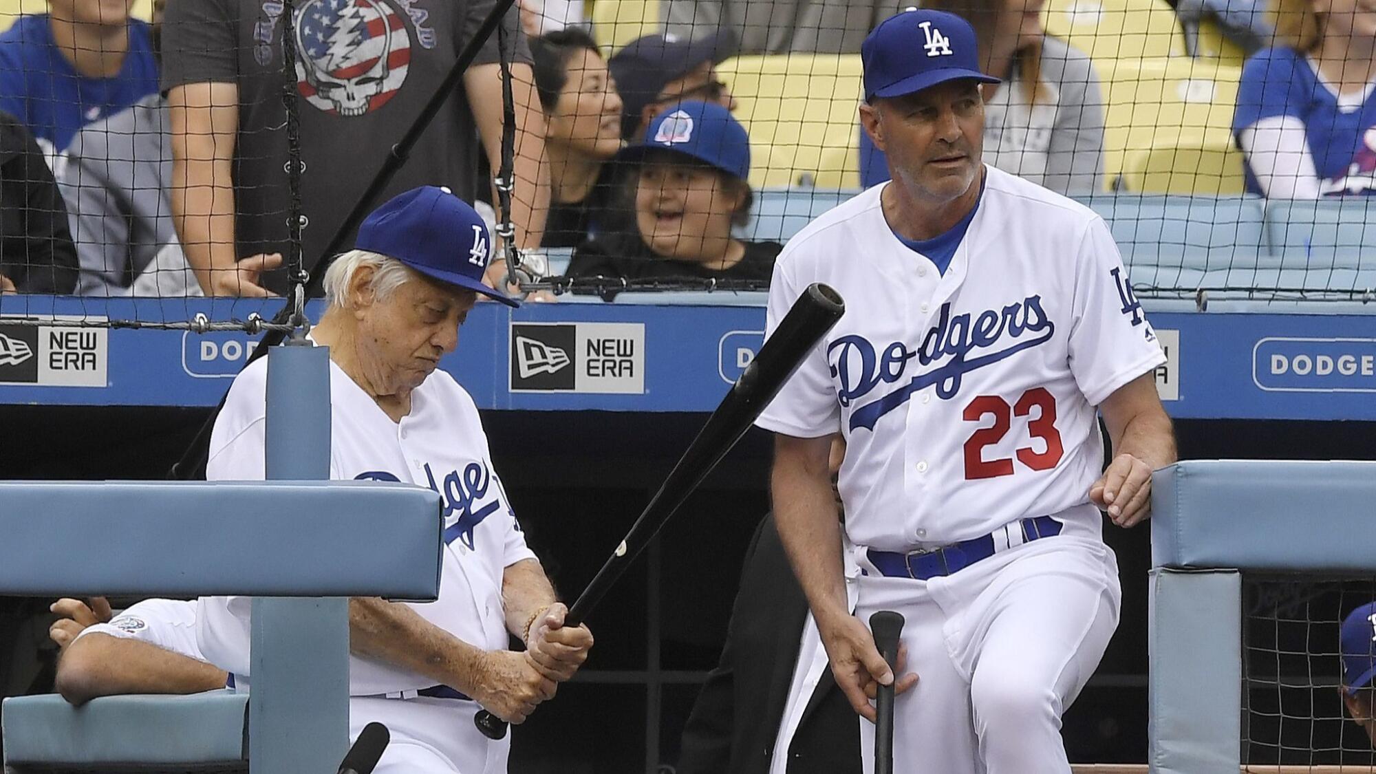 Former Dodgers manager Tommy Lasorda and World Series hero Kirk Gibson at an old-timers game in 2018.