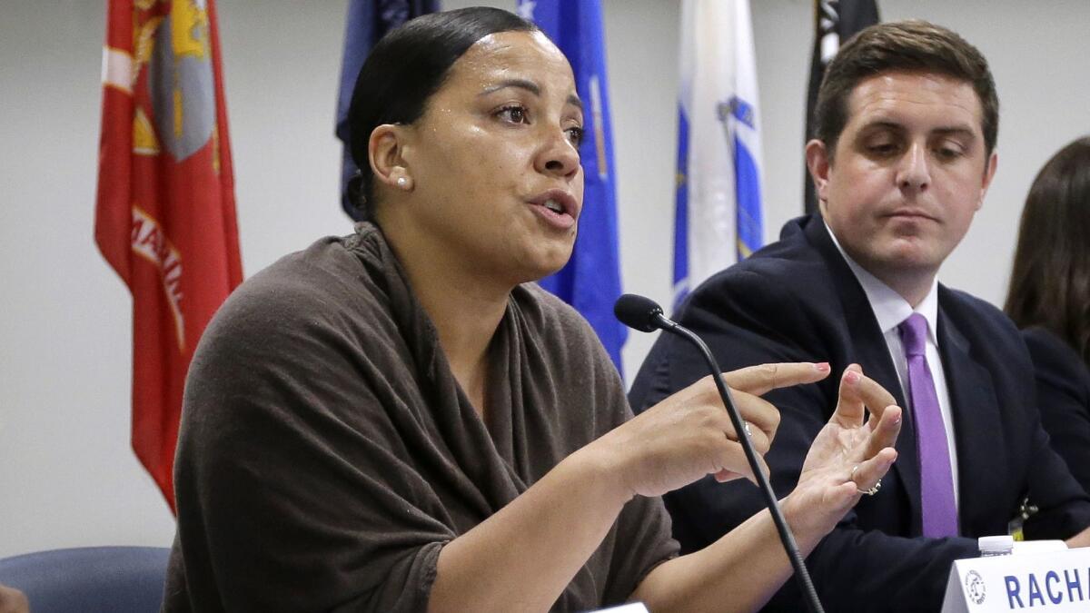 Rachael Rollins answers questions from inmates during a forum at the Suffolk County House of Correction in Boston.