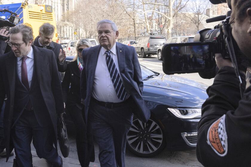Sen. Bob Menendez, D-N.J., arrives at Manhattan federal court, Monday, March 11, 2024, in New York. Sen. Menendez and his wife, Nadine, are charged with conspiring with three businessmen to accept bribes of gold bars, cash and a luxury car in return for the senator’s help in projects pursued by the businessmen. (AP Photo/Jeenah Moon)