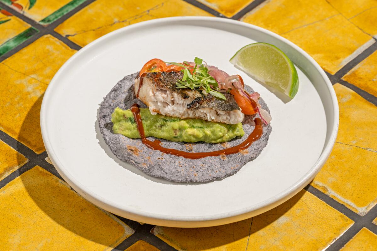 LOS ANGELES, CA - JUNE 11, 2023: A Taco de Pescado al Carbon from Holbox inside Mercado La Paloma on June, 11th, 2023 in Los Angeles . (Ron De Angelis / For The Times)