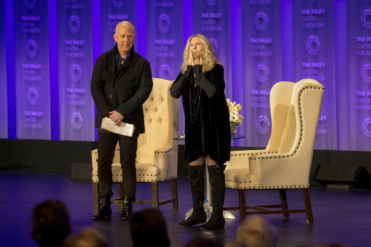 Barbra Streisand with host Ryan Murphy on the first night of PaleyFest 2018. This year's festival has been postponed over concerns about the spread of the coronavirus.