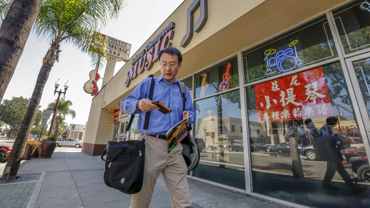 Located on E. Garvey Avenue in the Monterey Park business district, Johnny Thompson Music sits at the epicenter of an ongoing wave of Asian immigration that has changed the San Gabriel Valley.