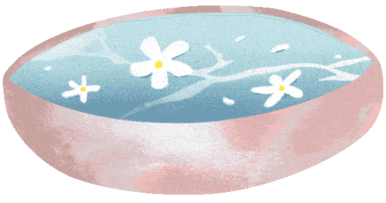 A bowl of water with flowers.