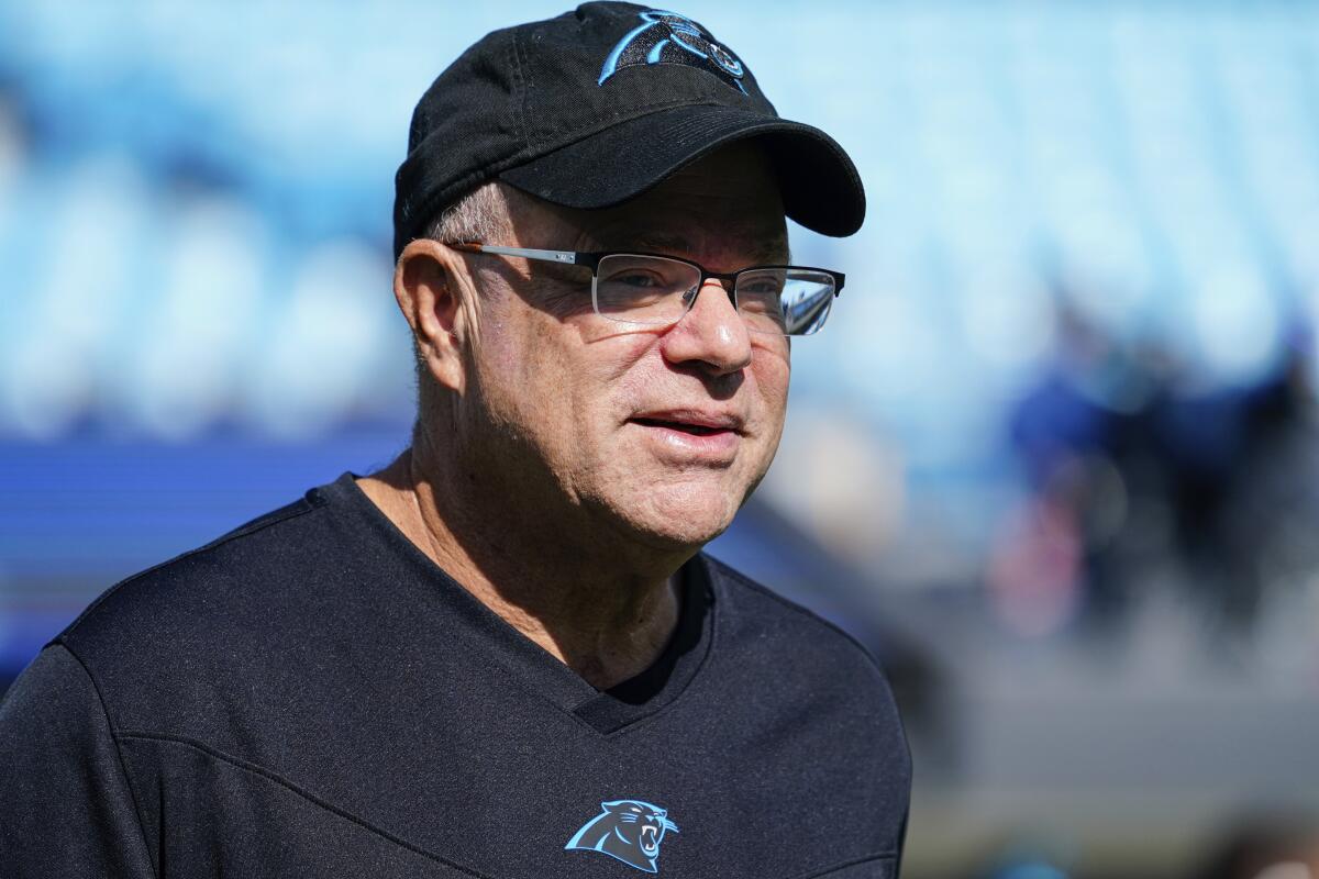 FILE - Carolina Panthers team owner David Tepper looks on before an NFL football game against the Minnesota Vikings on Oct. 17, 2021, in Charlotte, N.C. Tepper's real estate company filed court papers on Tuesday, Sept. 13, 2022, asking to revoke a bankruptcy settlement it was trying to make with a city and county in South Carolina over its abandoned practice facility. (AP Photo/Jacob Kupferman, File)