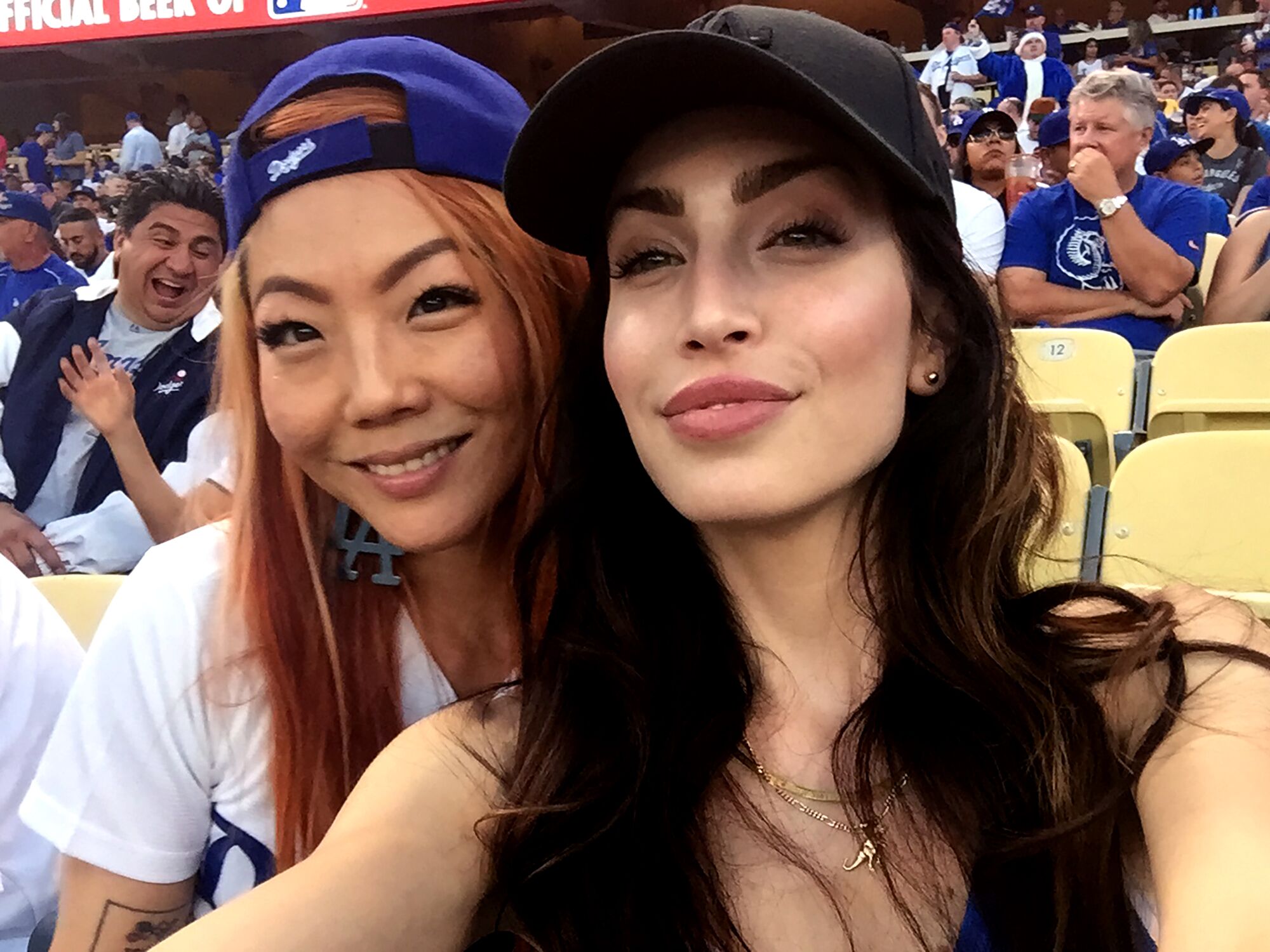Yuni Kim and Stevie Ryan at a Dodgers game in 2016.