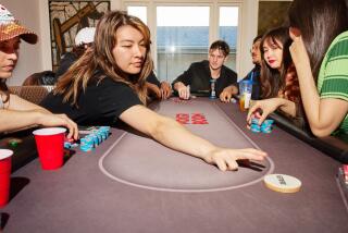 LOS ANGELES, CA - MARCH 4: One of three tables at gallerist Eric Kim's poker game, held at his home on Saturday, March 4, 2023 in Los Angeles, CA. (Maggie Shannon / For The Times)