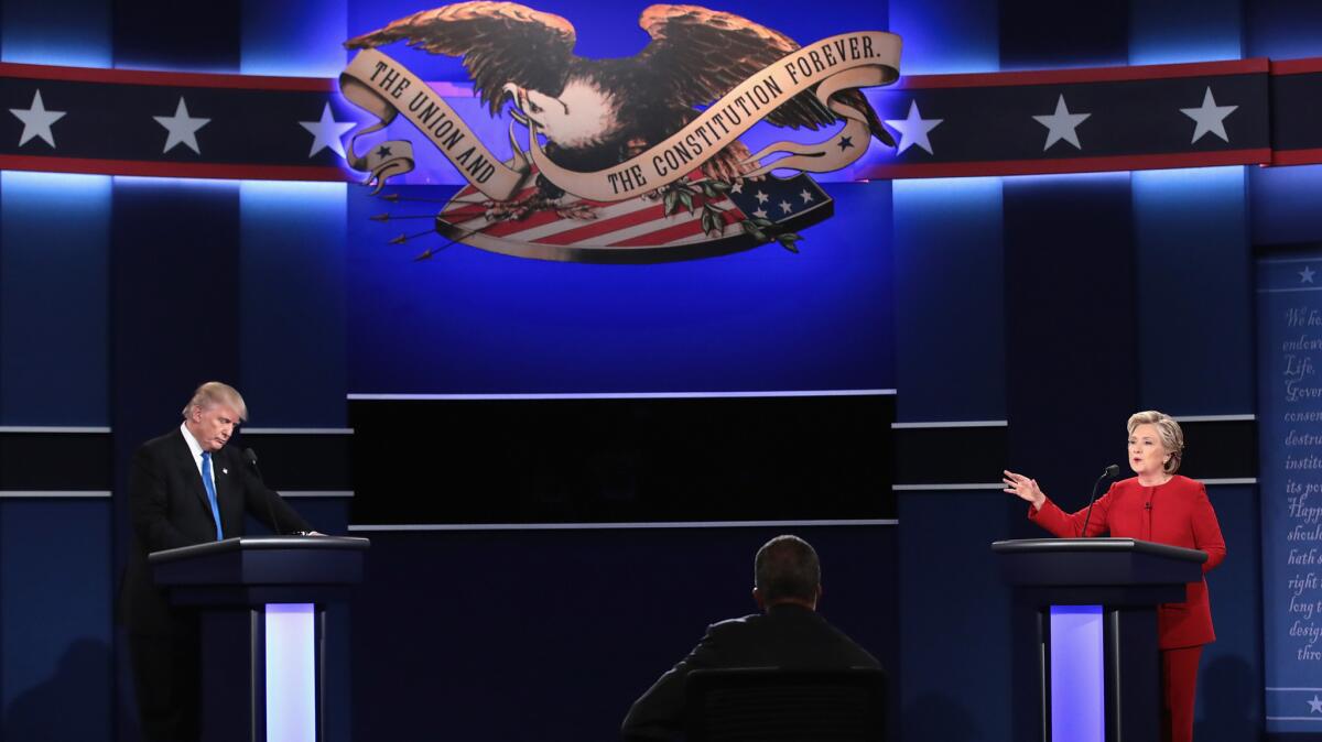 Donald Trump, Hillary Clinton and moderator Lester Holt at the first presidential debate in 2016.