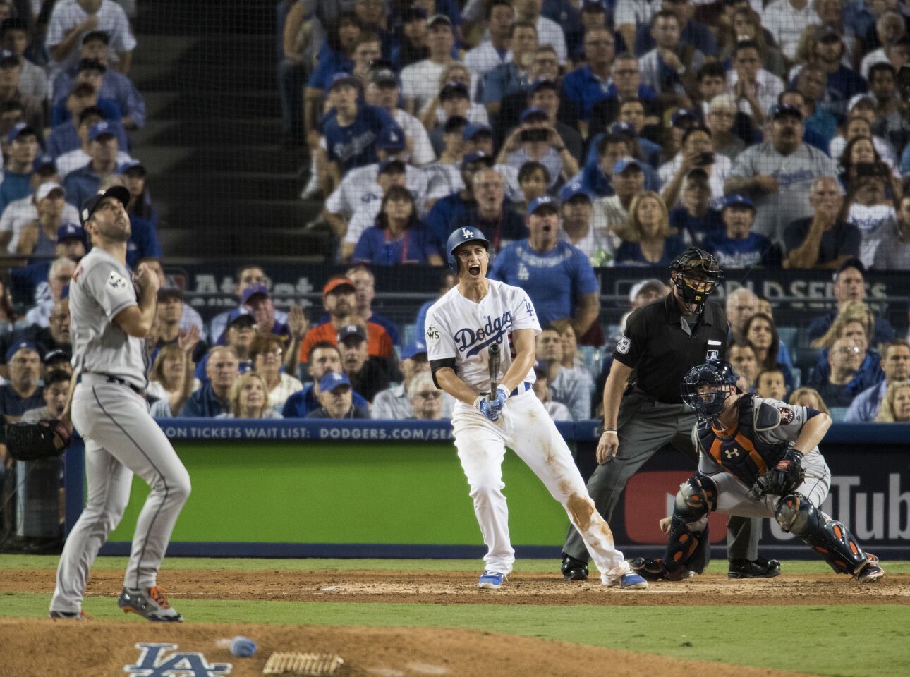 Corey Seager lets out a yell as he hits a two-run home run against Houston starting pitcher Justin Verlander in the sixth inning.