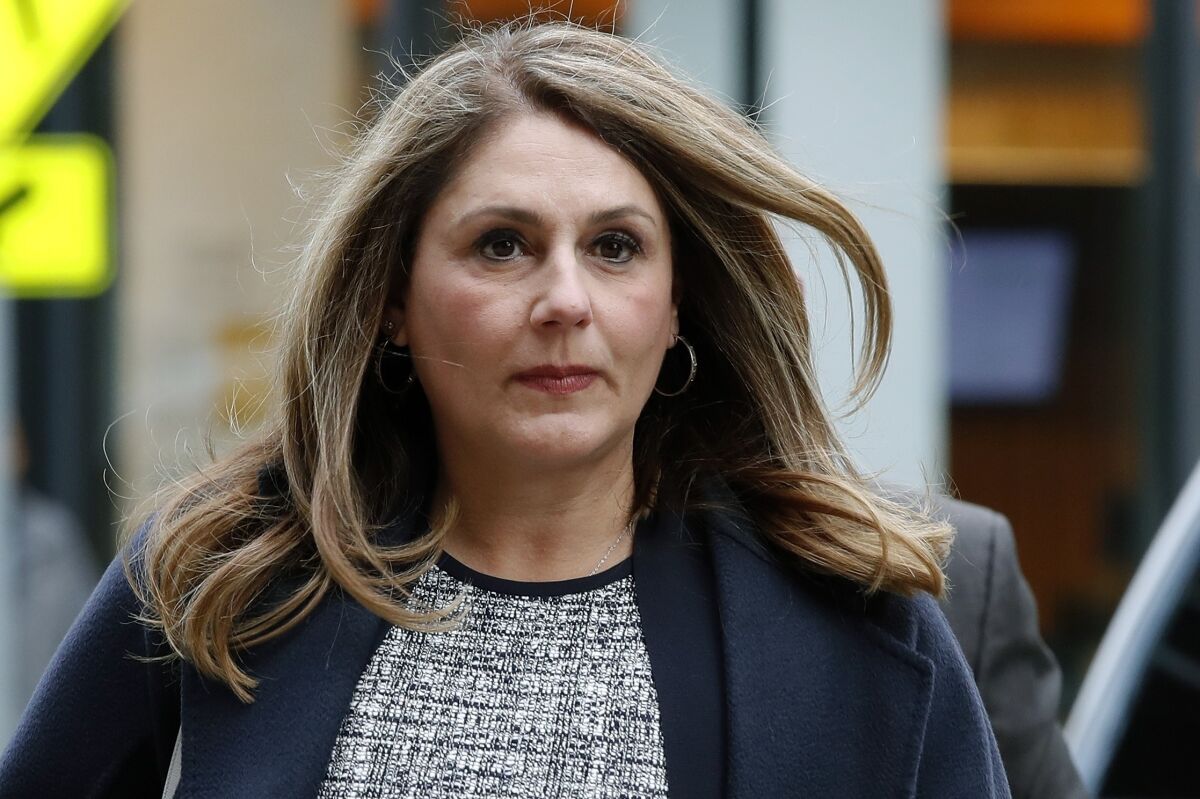 Michelle Janavs arrives at federal court in Boston on Feb. 25 for sentencing in a nationwide college admissions bribery scandal.
