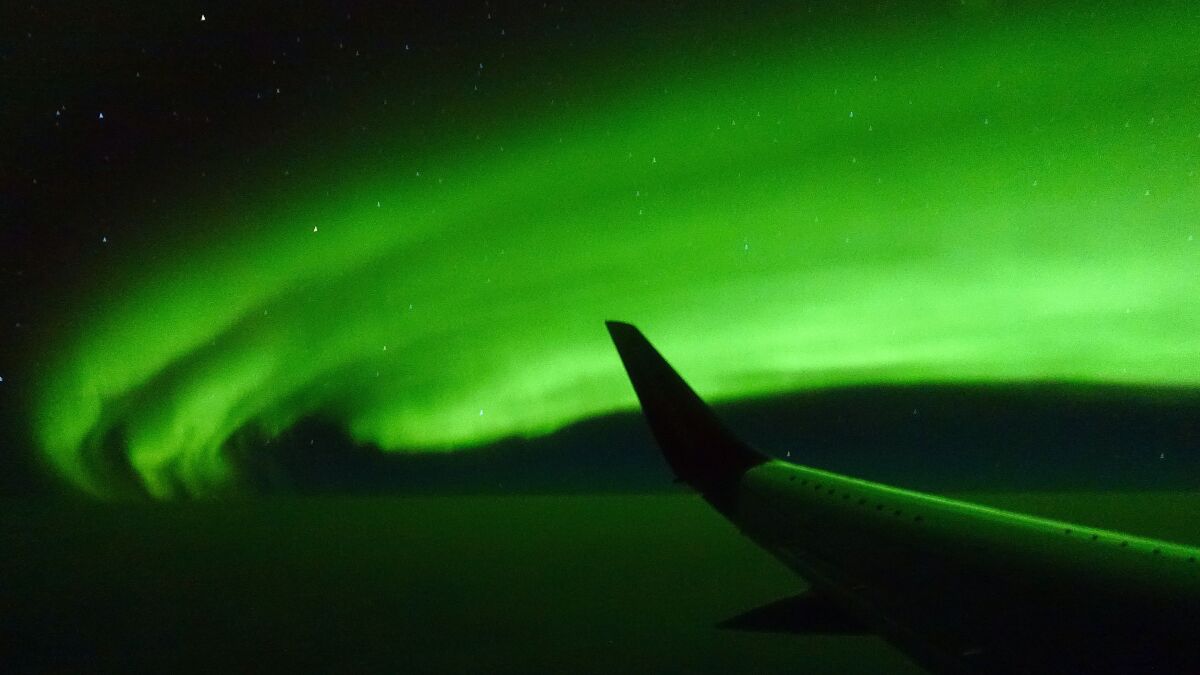 Northern Lights aboard a chartered 737