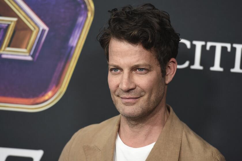 Nate Berkus smiles at a movie premiere for "Avengers: Endgame"