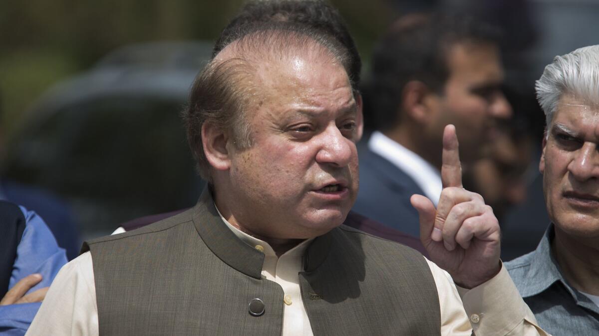 Pakistani Prime Minister Nawaz Sharif speaks to reporters outside the premises of the Joint Investigation Team in Islamabad on June 15, 2017.