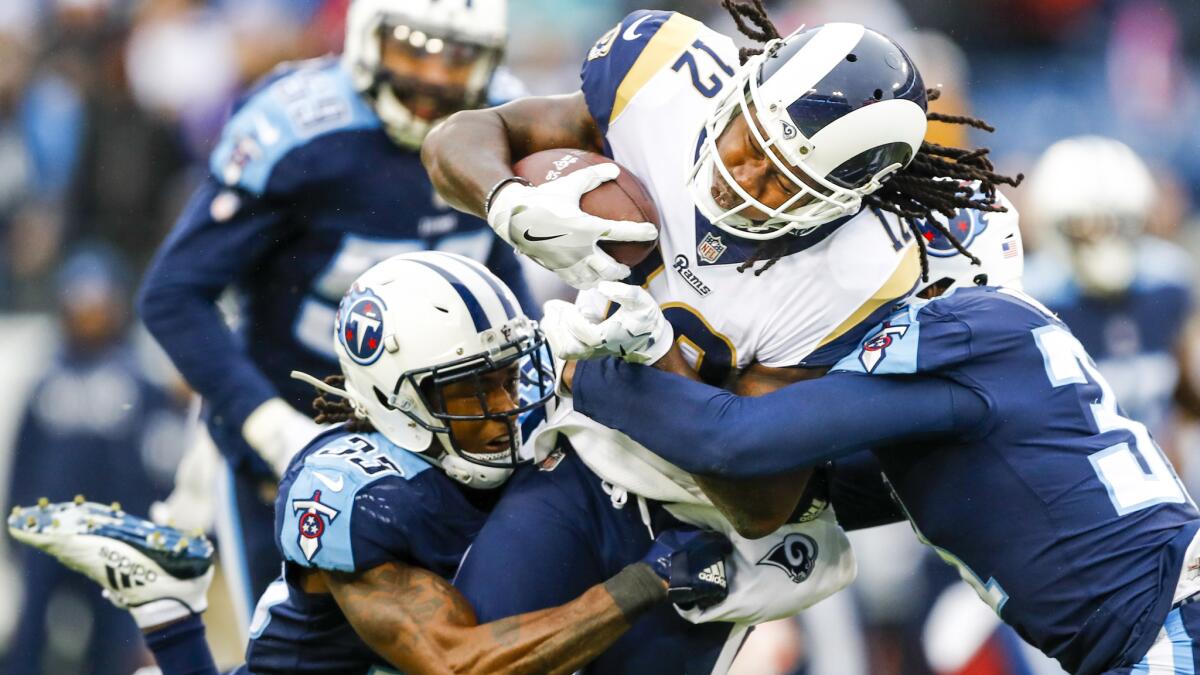 Rams receiver Sammy Watkins carries the ball against the Titans on Dec. 24, 2017.