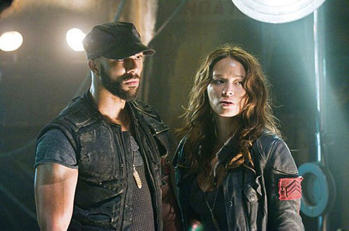 Rapper Common co-starred in the 2009 movie,  "Terminator Salvation." He is shown here in a scene with with actress Moon Bloodgood.

