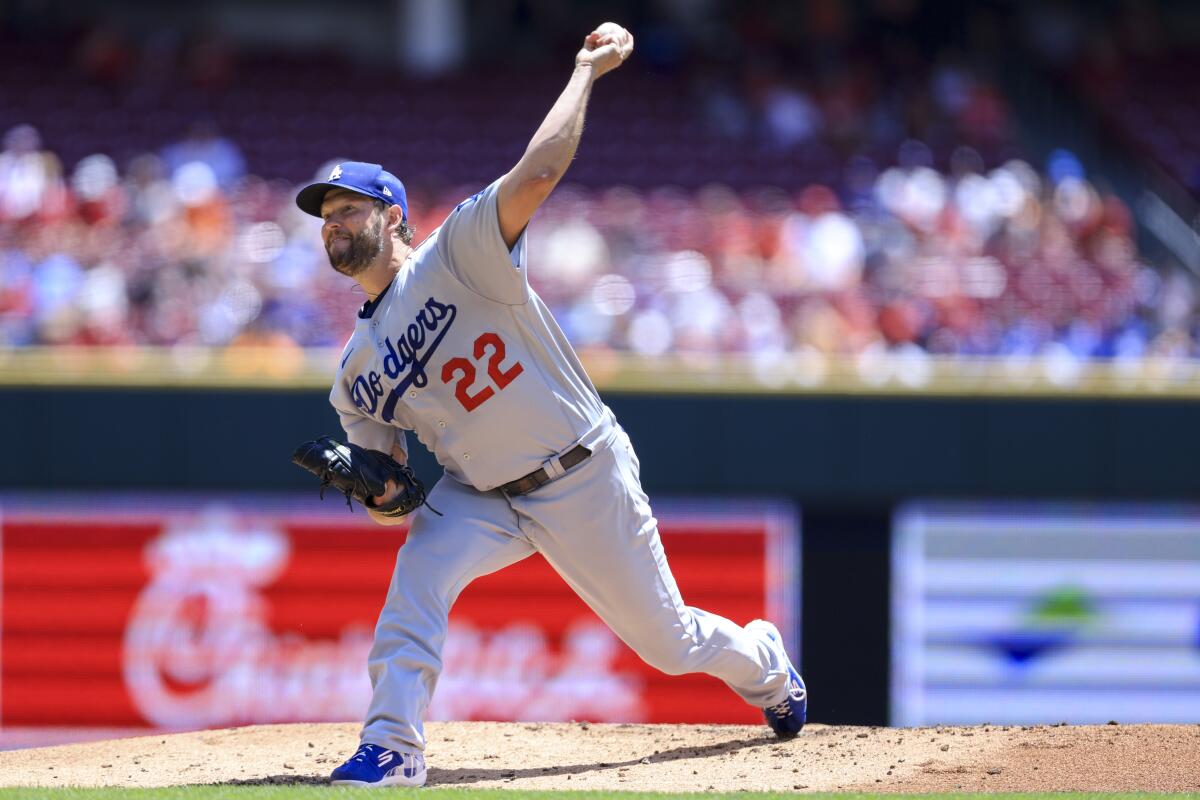The Dodgers' Clayton Kershaw throws during the first inning game against the Reds on Thursday.
