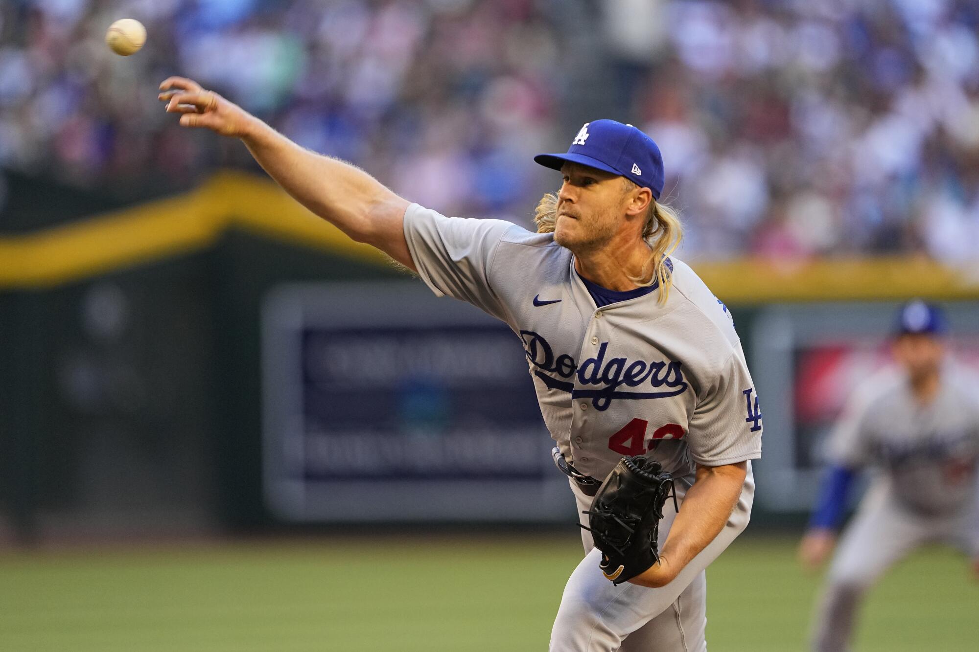 Dodgers starting pitcher Noah Syndergaard delivers during the first inning.