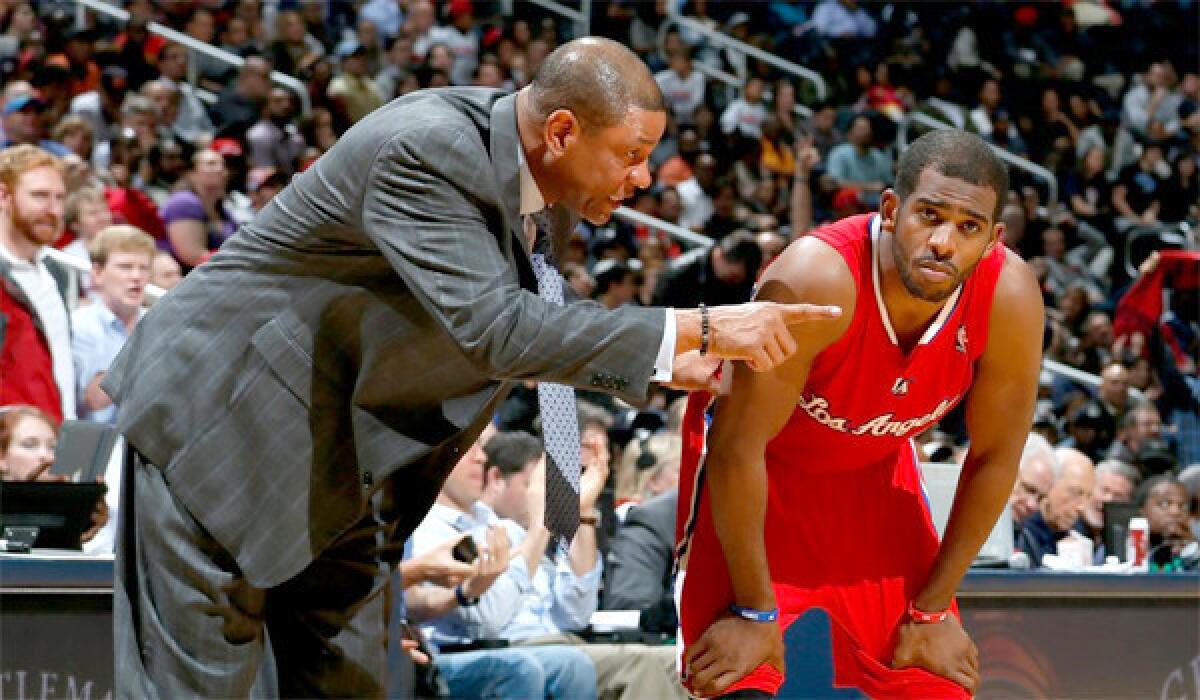 Clippers Coach Doc Rivers directs Chris Paul from the sideline during a game against the Atlanta Hawks on Dec. 4.