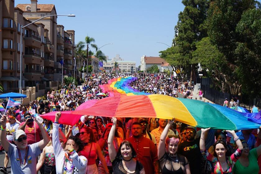 Marchers take to the street during the 2019 San Diego Pride parade in Hillcrest. San Diego Pride festivities for 2020 have been canceled this year due to the coronavirus pandemic.