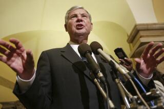 FILE - Senate Intelligence Committee Chairman Sen. Bob Graham, D-Fla., gestures as he answers questions regarding the ongoing security hearing on Capitol Hill, June 18, 2002, in Washington. Graham, who chaired the Intelligence Committee following the 2001 terrorist attacks and opposed the Iraq invasion, has died, according to an announcement by his family Tuesday, April 16, 2024. (AP Photo/Pablo Martinez Monsivais, File)