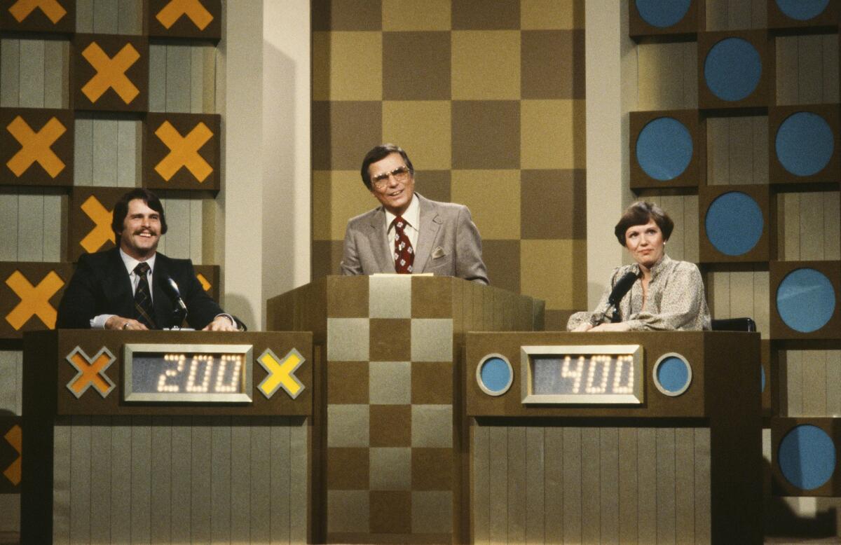 Peter Marshall, center, hosting NBC's 'Hollywood Squares' in 1980