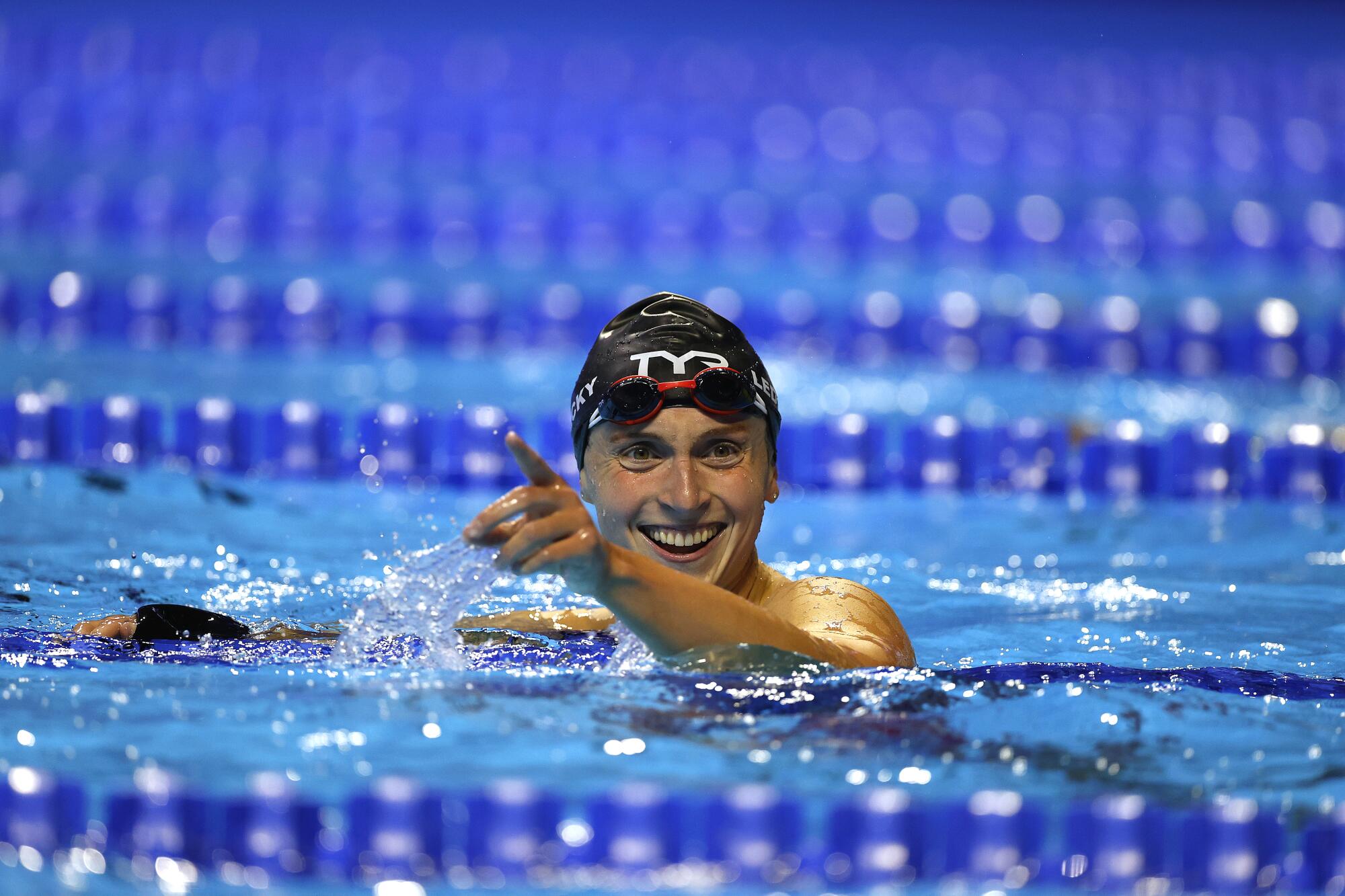 Katie Ledecky reacts after competing in the women’s 800-meter freestyle final during the U.S. Olympic trials 