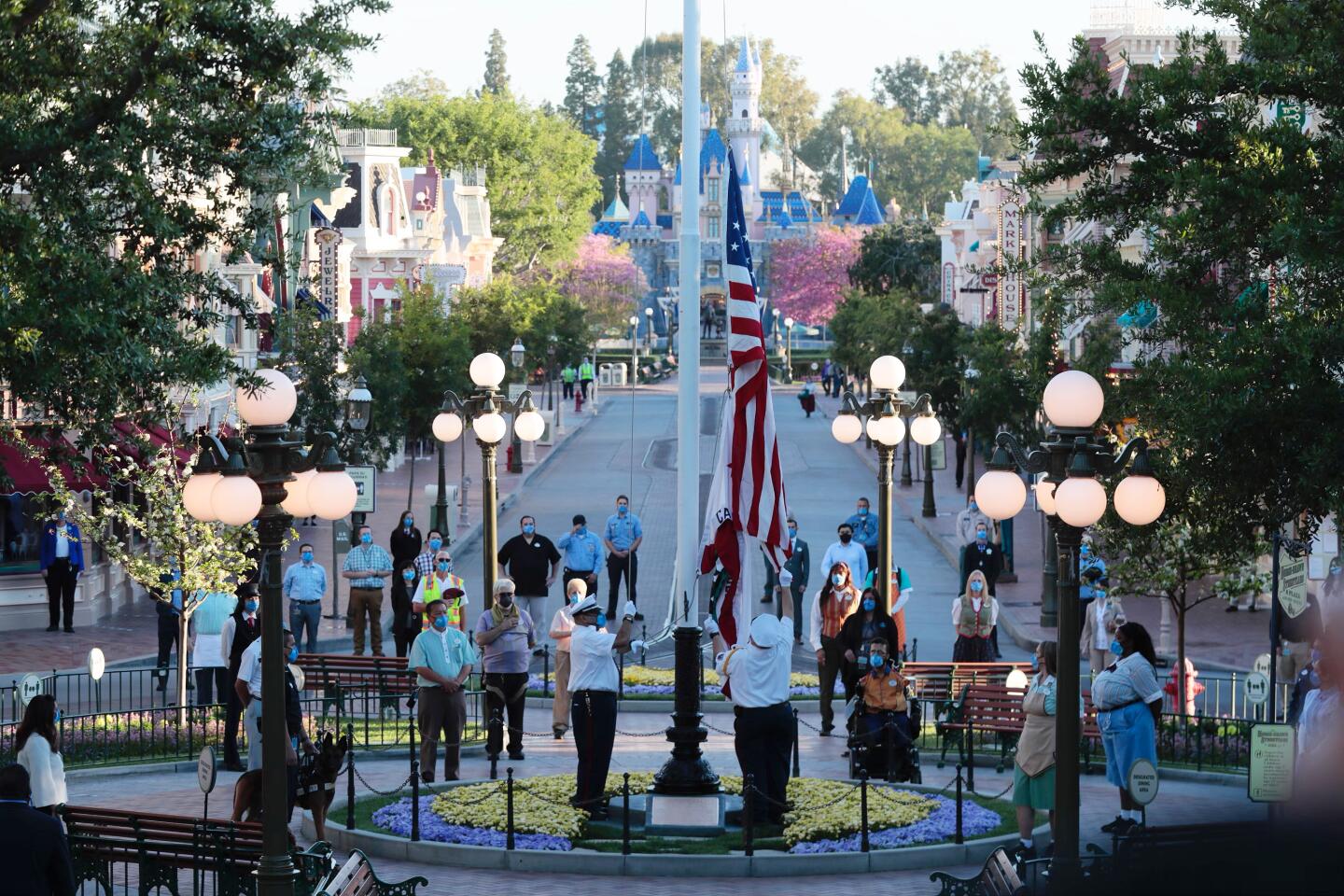 The flag is raised at Disneyland.