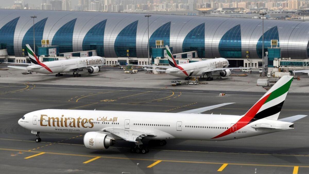 An Emirates plane taxis to a gate at Dubai International Airport in the United Arab Emirates on March 22, 2017.