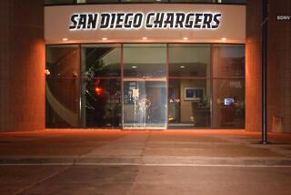 San Diego Chargers fans clean up egged headquarters