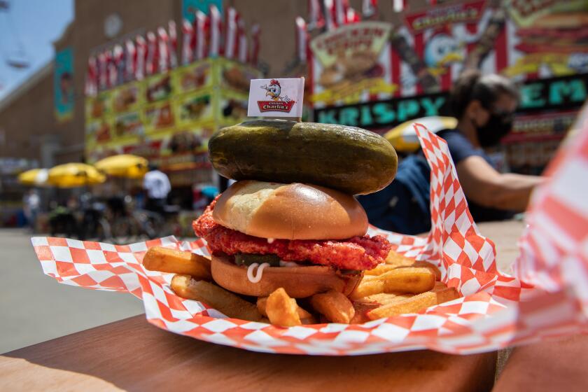 Del Mar, CA - June 08: The Kool-Aid Chicken Sandwich at Chicken Charlie's is one of the new food items at the San Diego County Fair Del Mar, CA on Wednesday, June 8, 2022. (Adriana Heldiz / The San Diego Union-Tribune)