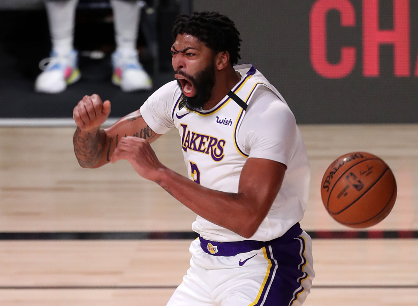 Lakers forward Anthony Davis reacts after dunking on the Houston Rockets in Game 3 of the Western Conference semifinals.