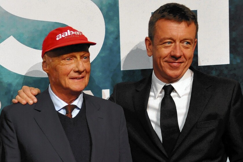 Niki Lauda, left, and Peter Morgan attend the Austria premiere of the film "Rush."