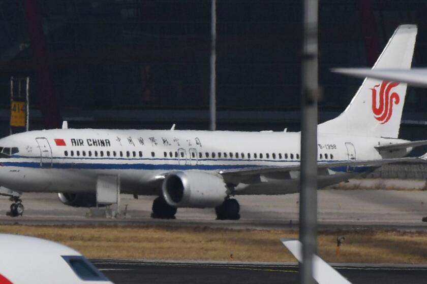 An Air China Boeing 737 MAX 8 plane is seen at Beijing Capital Airport on March 11, 2019. - China on March 11, 2019 ordered domestic airlines to suspend commercial operation of the Boeing 737 MAX 8, citing the Ethiopian Airlines crash and another deadly accident of that same model in Indonesia. (Photo by GREG BAKER / AFP)GREG BAKER/AFP/Getty Images ** OUTS - ELSENT, FPG, CM - OUTS * NM, PH, VA if sourced by CT, LA or MoD **