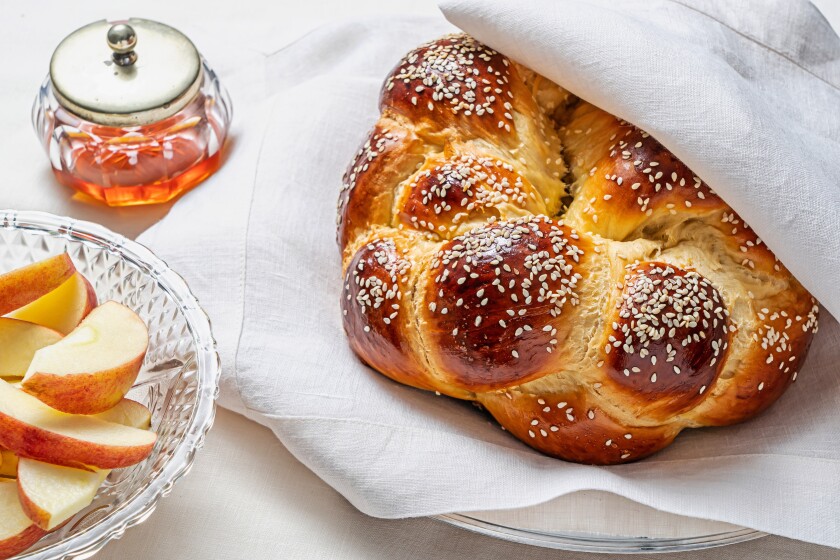 Challah With Olive Oil and Honey. The bread is traditionally braided into a round loaf for High Holidays.