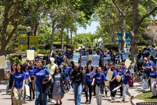 Los Angeles, CA - May 17: Students and supporters gathered to support undocumented students in the University of California system, rallying and marching to protest outside a meeting of the UC Board of Regents meeting, on the UCLA Campus in Los Angeles, CA, Wednesday, May 17, 2023. The rally wants to demand the UC Board of Regents break legal ground and authorize the hiring of students who were brought to this country illegally as children and lack valid work permits. (Jay L. Clendenin / Los Angeles Times)