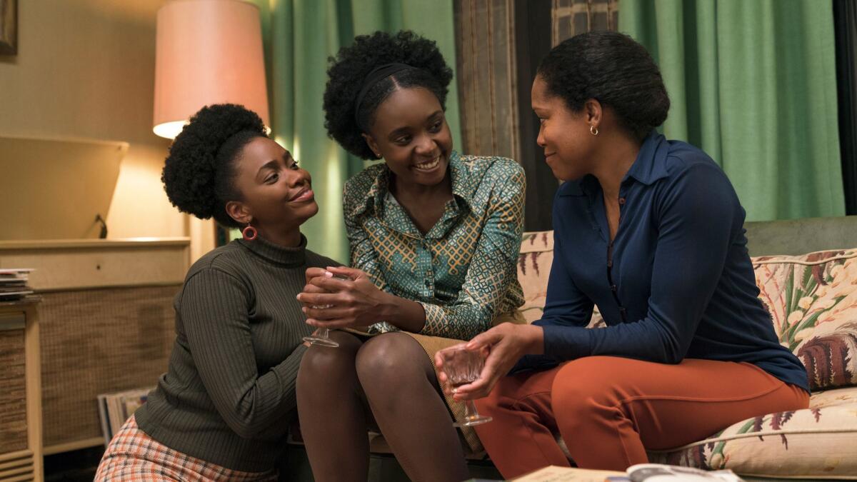 Teyonah Parris, left, KiKi Layne and Regina King in a scene from "If Beale Street Could Talk."