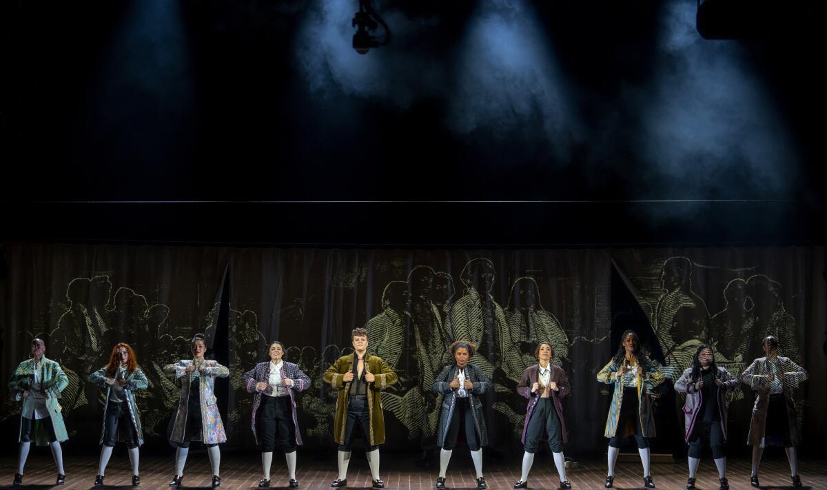 The national tour cast of "1776" performs on stage.